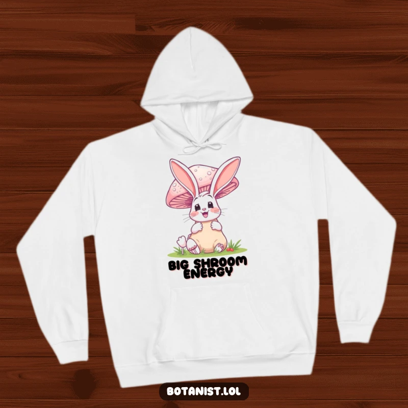 Funny hoodie displaying a happy bunny gasping with delight at an oversized, magical mushroom in the wild.