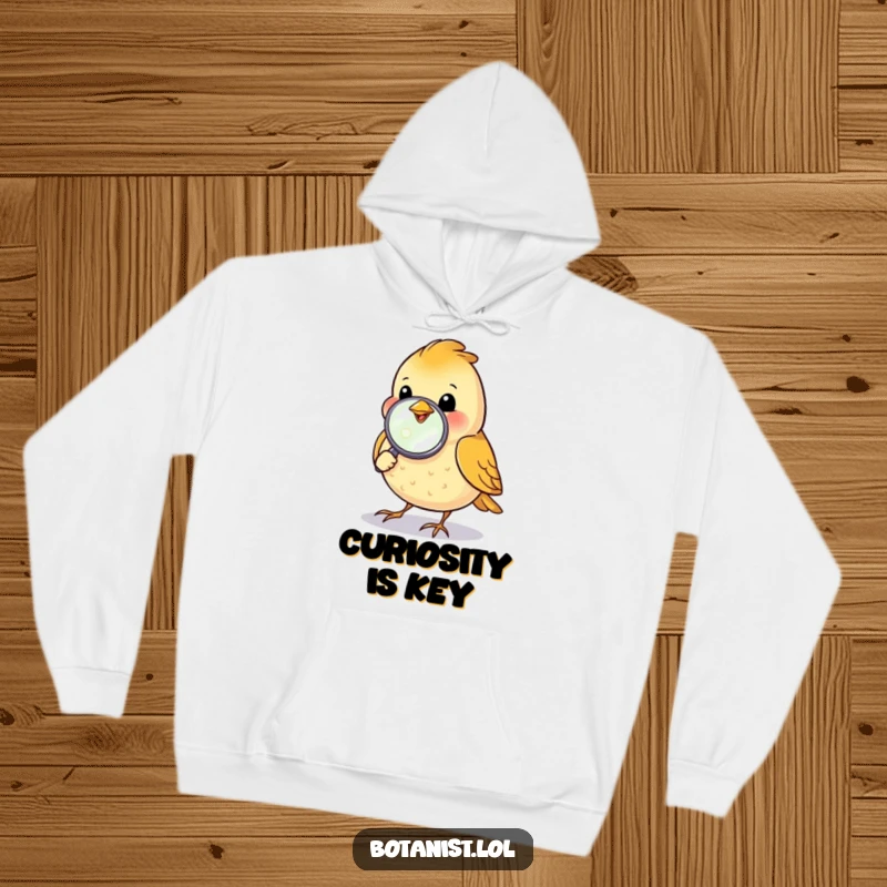 Funny bird inspecting a dewdrop with a magnifying glass, a warm and comfortable hoodie for explorers.