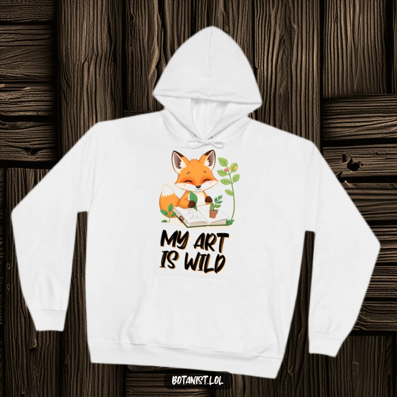 Funny hoodie featuring a happy fox artistically drawing plants in a sketchbook with a leaf, a cozy funny gift.