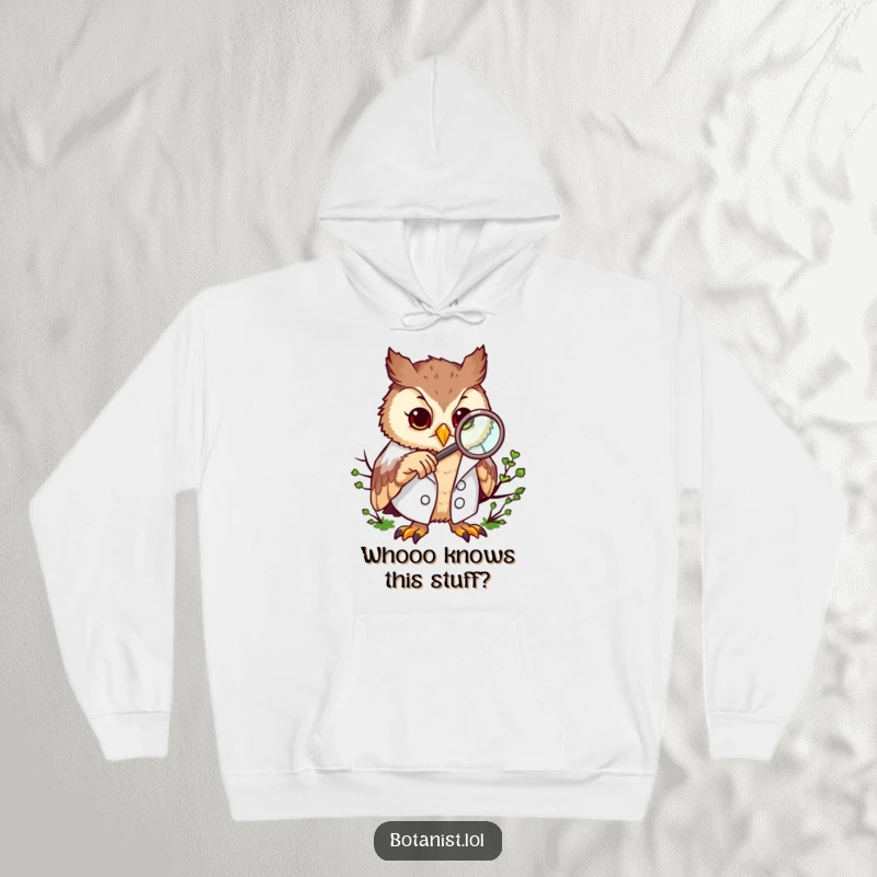 Funny hoodie depicting a curious owl in a lab coat, closely examining moss with a magnifying glass.