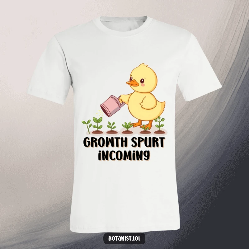 Funny t-shirt: A duckling with a determined look waters tiny plants with a watering can. A charming and funny gardening gift idea.