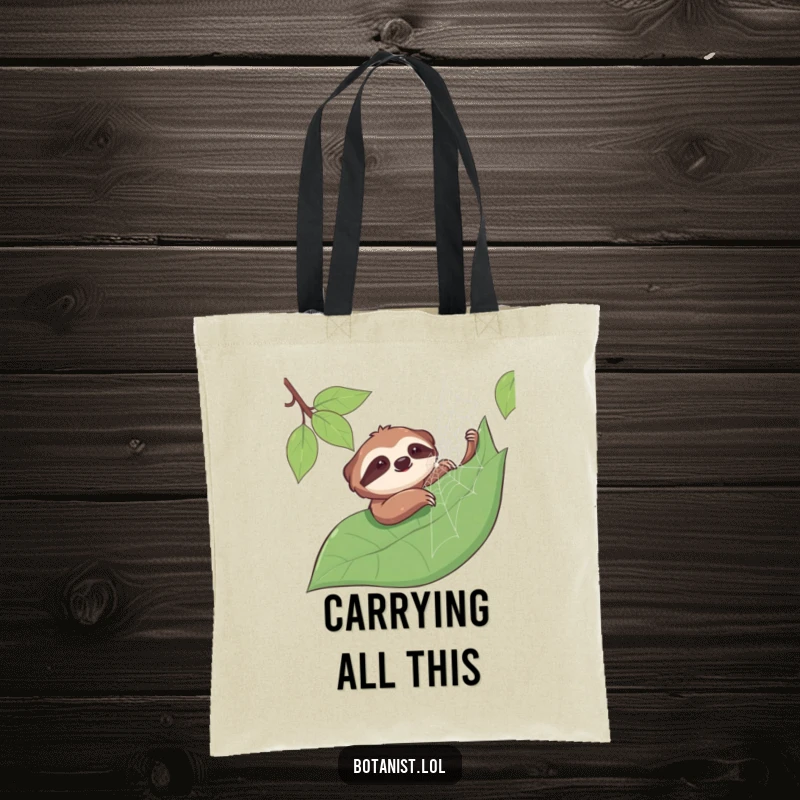 Funny sloth tote bag featuring a smiling sloth gently touching a dewy spiderweb on a leaf, a charming accessory for nature enthusiasts.