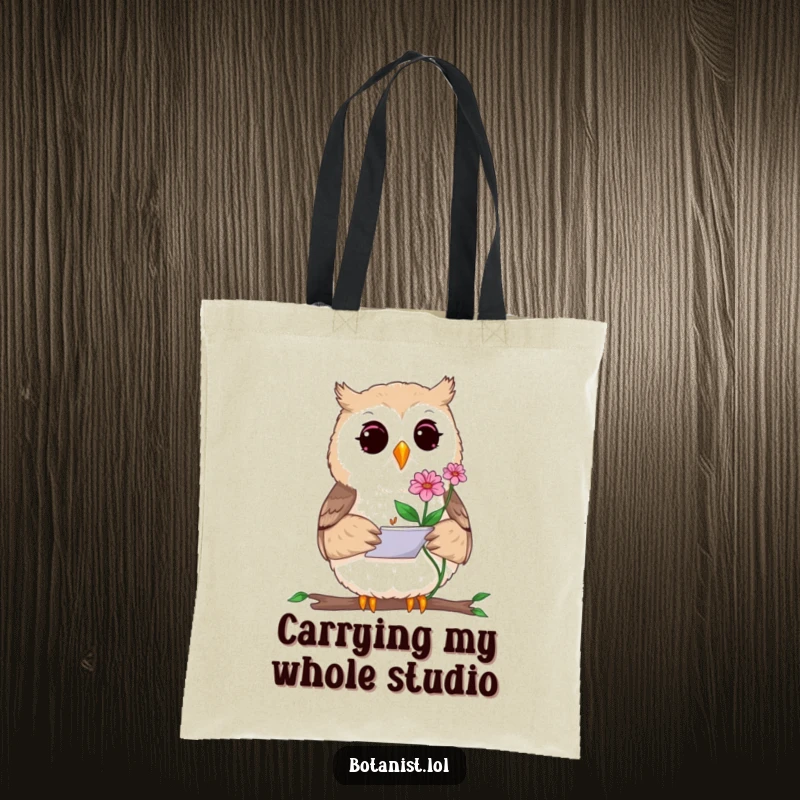 Funny tote bag featuring a curious owl artist focused on sketching a blooming plant with a small notepad, ideal for carrying art supplies or daily items.