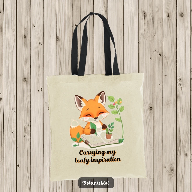 Funny tote bag illustrating a happy fox sketching plants in a sketchbook using a leaf, a functional funny gift.